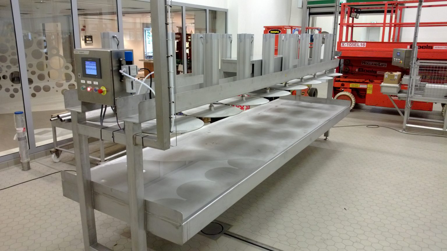 Cheese pressing and mould handling Scherjon Dairy Equipment